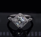 Angled front perspective of a white gold 2 CT Asscher cut lab grown diamond kite-set halo engagement ring.