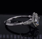 Side-angle shot displaying the vintage-inspired shoulder collar detail and micro-pavé accent diamonds on the white gold band.