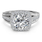 Direct top view of a 4 CT round cut lab grown diamond engagement ring with cushion-shaped milgrain halo and split-shoulder band.