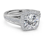 Alternate three-quarter perspective angle of a 4 carat round lab grown diamond halo ring with detailed milgrain split band.