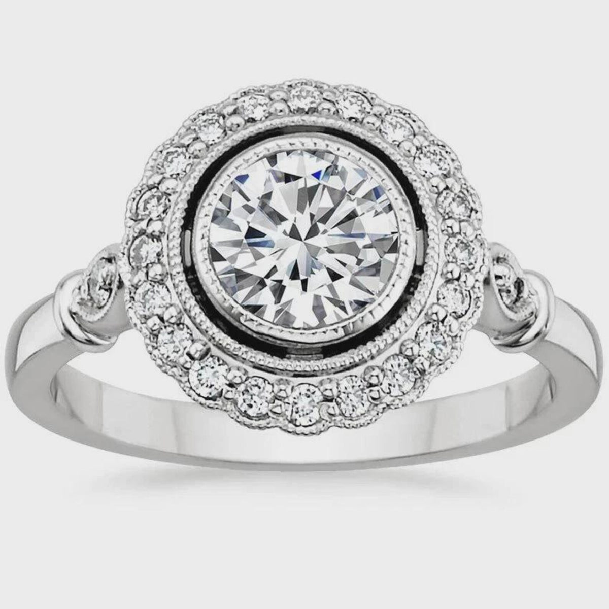 3 carat round cut lab grown diamond engagement ring featuring a milgrain bezel setting, scalloped halo, and detailed shoulders.
