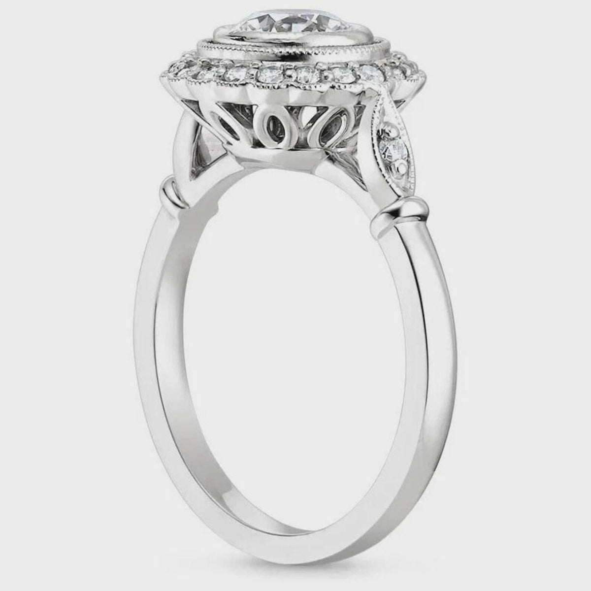 Detailed side profile showing the intricate scrollwork basket and high-polish band of a 3 CT round lab diamond ring.