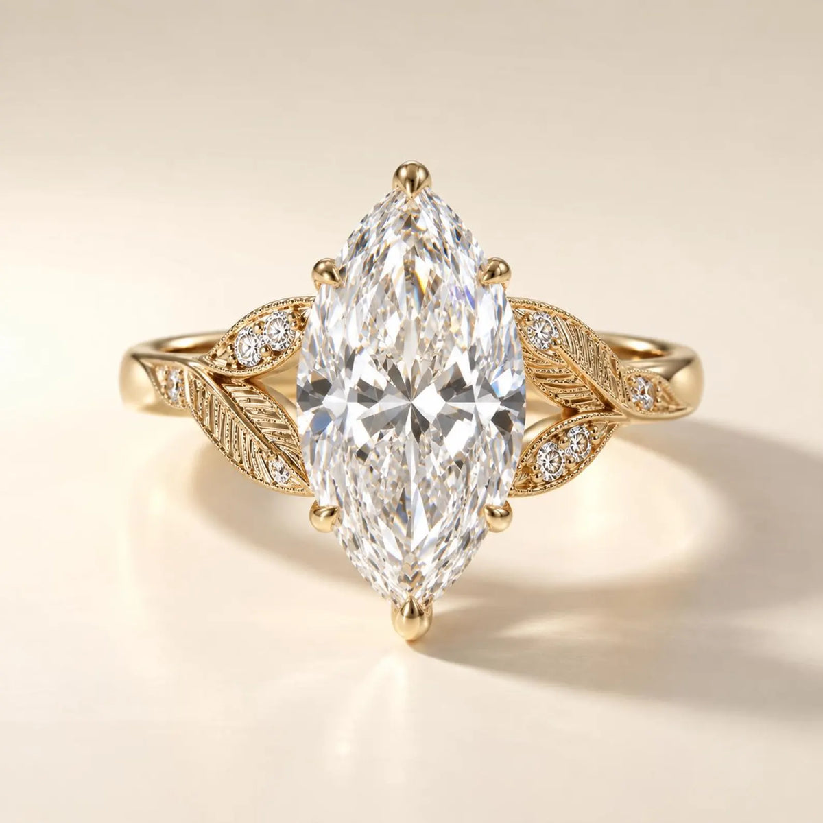 Front view showcasing a symmetrical 4 carat marquise lab diamond ring with leaf patterned side accents.