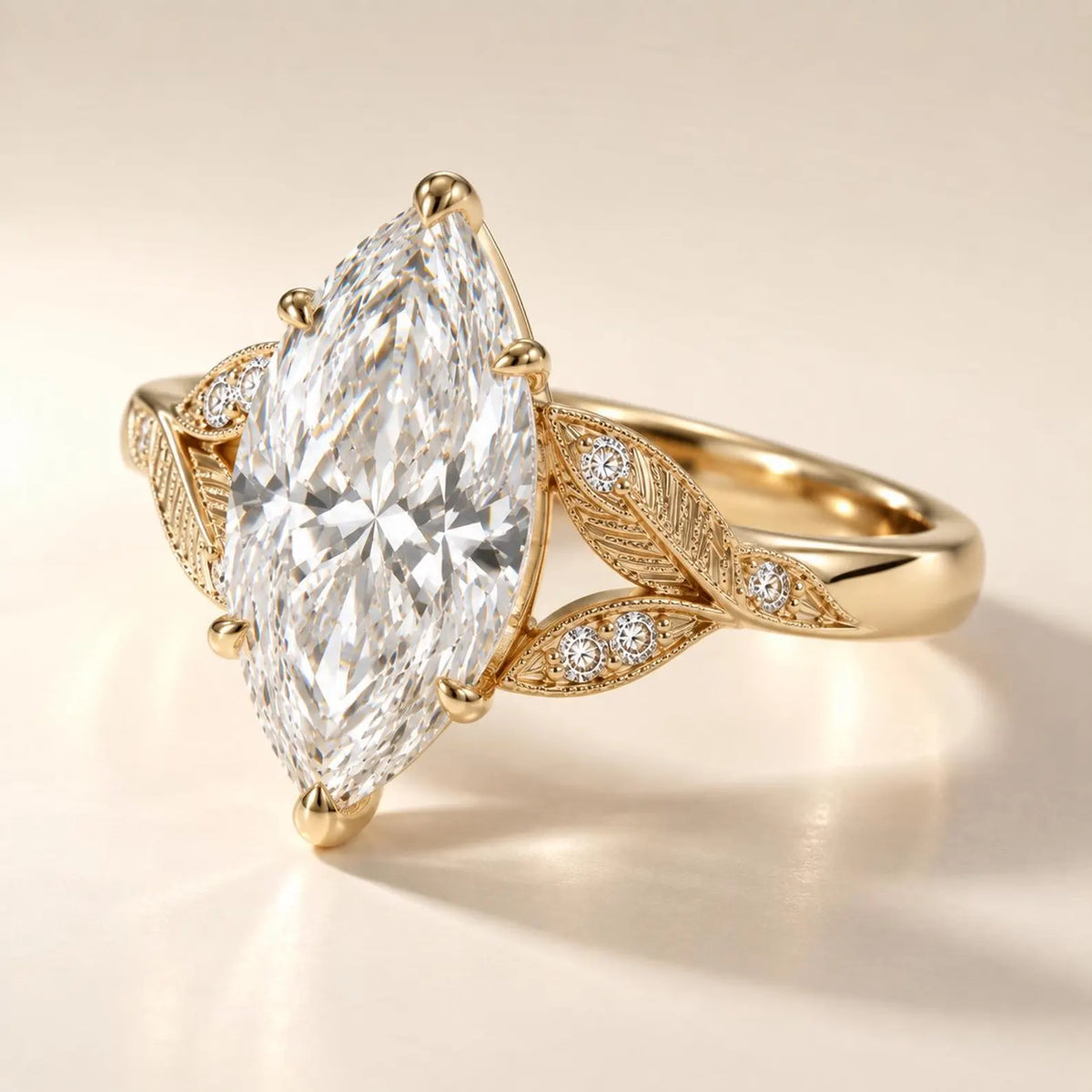 Close-up angled view highlighting the leaf texture, round diamond accents, and 6-prong setting of a 4 CT marquise diamond ring.
