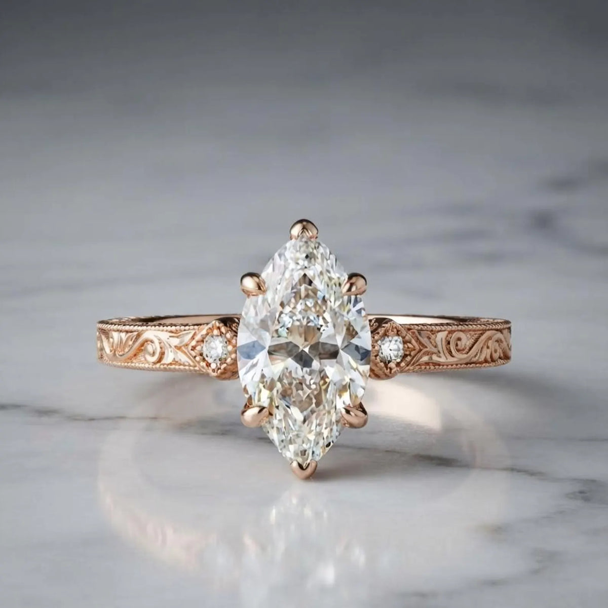 Studio shot on marble of a 3 CT marquise lab grown diamond ring in rose gold with vintage scrollwork band.