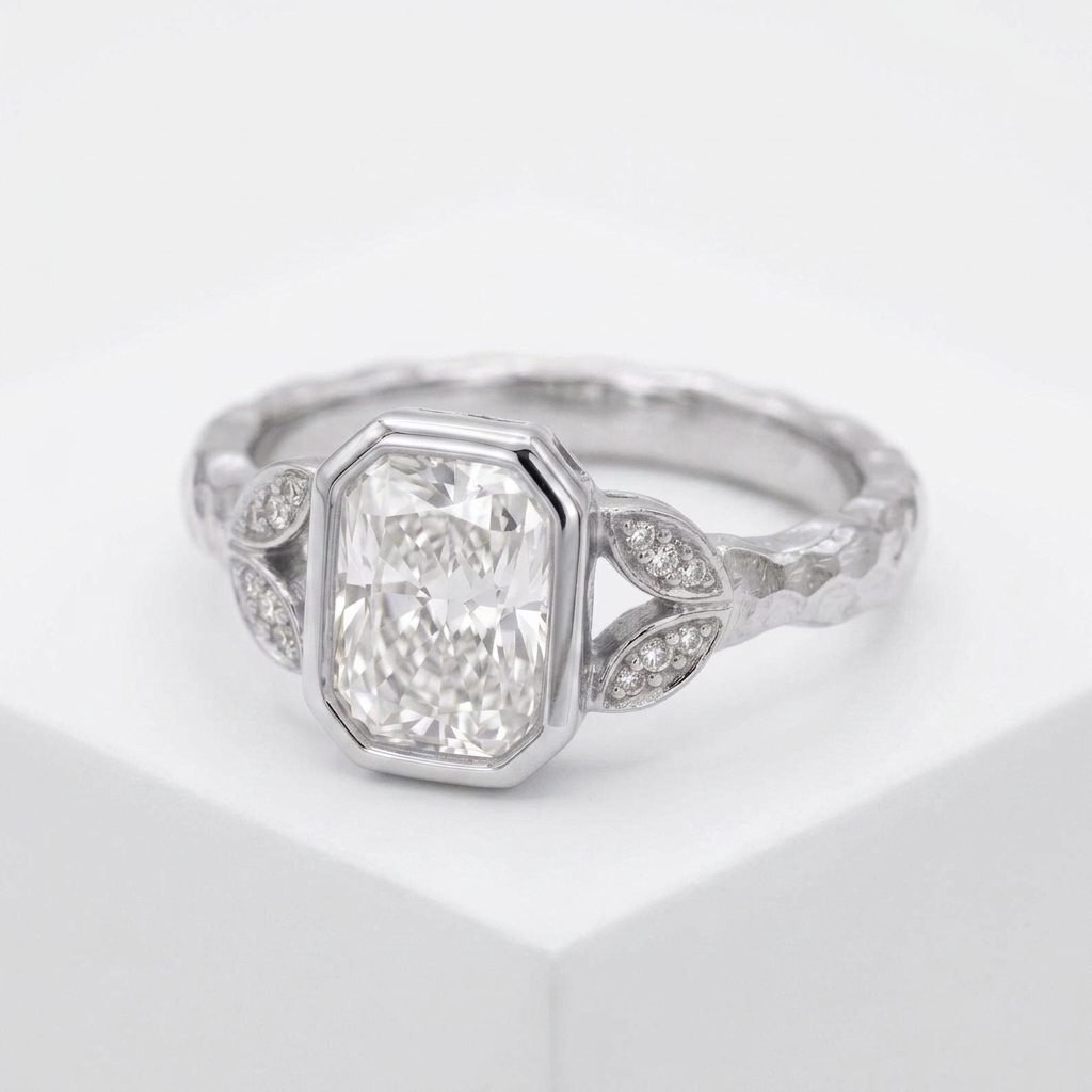Angled view of a 3 CT radiant cut lab grown diamond ring with full bezel border in white gold.