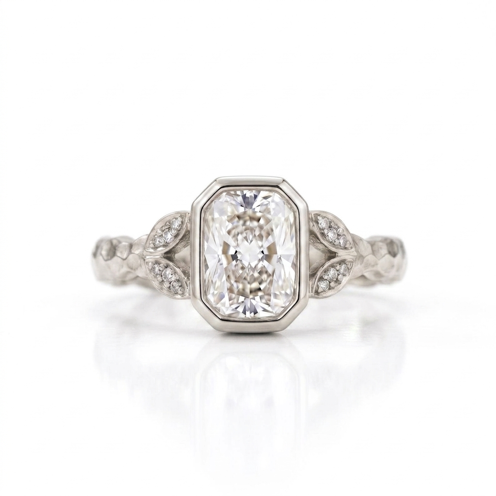 Top view of a 3 CT radiant cut lab grown diamond bezel ring in white gold with leaf shoulders.