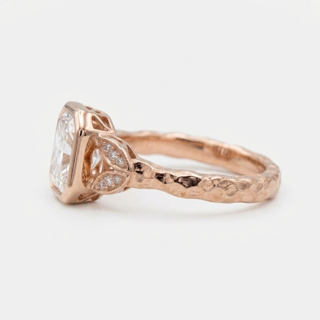 Side profile of a 3 CT radiant cut lab diamond bezel ring in rose gold showing the leaf shoulder design.