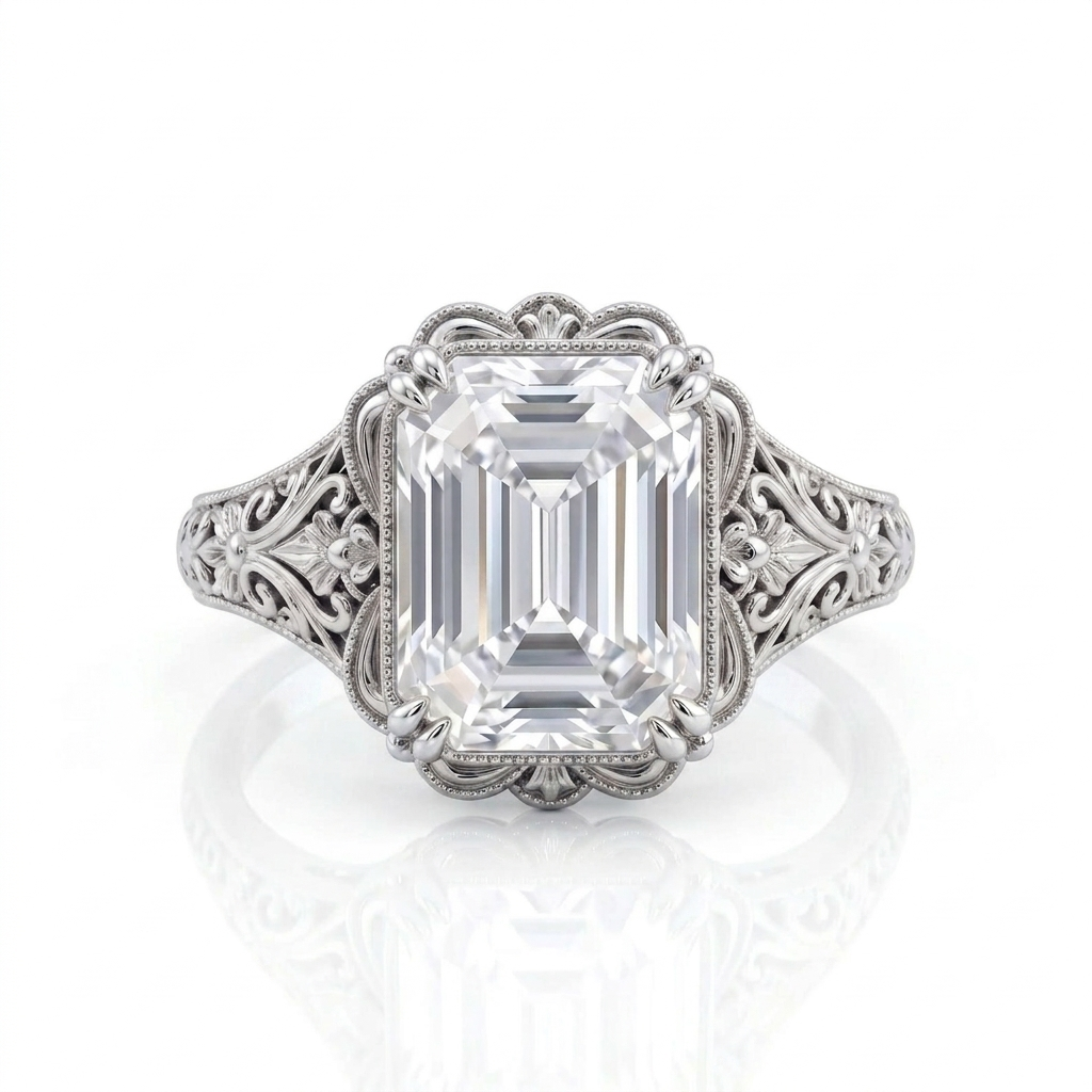Top-down view of a 5 CT emerald cut lab grown diamond ring in white gold with scalloped milgrain bezel border.