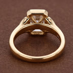 Undergallery side profile of a 5 CT radiant lab diamond ring displaying the 18K yellow gold band and open basket.