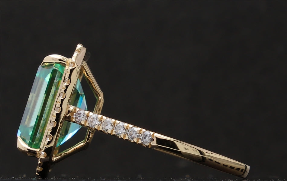 Profile detail of the yellow gold band and stone setting on the 4 CT green emerald cut moissanite ring.