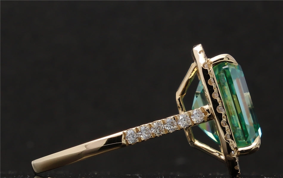 Detailed look at the sparkling pave diamonds along the slim yellow gold ring shank.