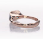 Back view showing the smooth, comfortable inner profile of the rose gold ring band.
