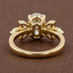Undergallery perspective showing structural basket craftsmanship of a 3 CT oval lab diamond ring.