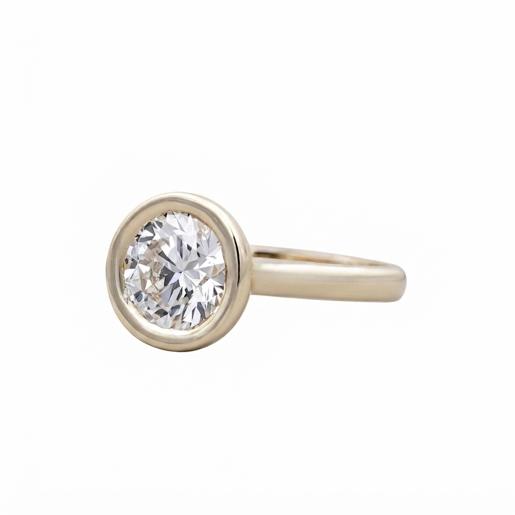 Three-quarter side profile view of a modern 3 CT round lab grown diamond solitaire bezel ring.
