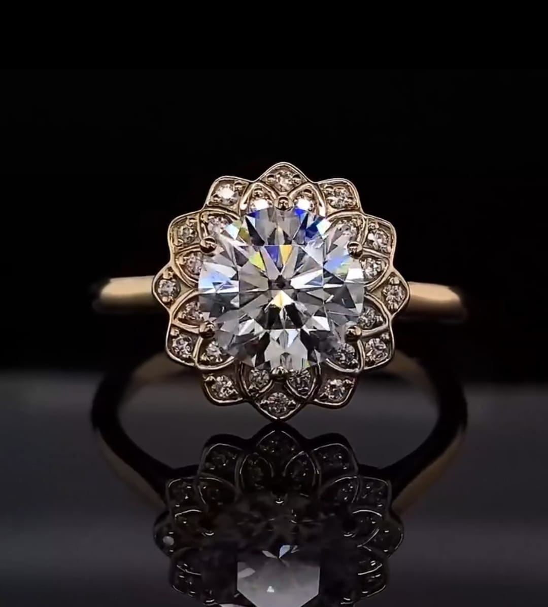 Direct top-down view of a 3 CT round cut lab grown diamond engagement ring featuring a stunning floral scalloped diamond halo.