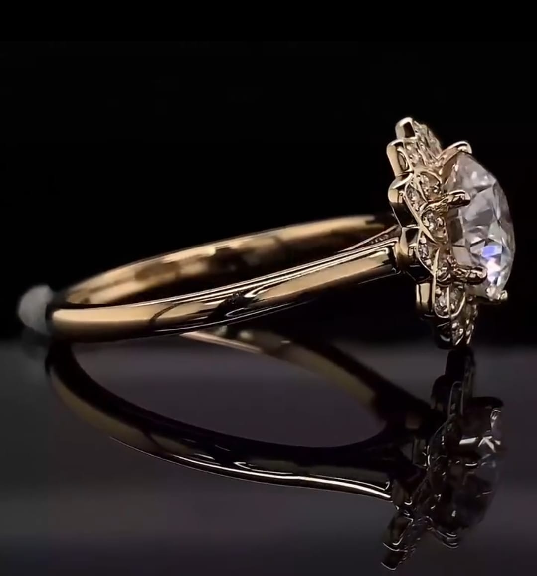 Side profile view revealing the intricate gallery and structural lotus-like design of the scalloped halo on a smooth gold band.