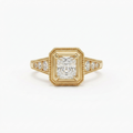 Direct top view of a 2 CT princess cut lab diamond ring set in yellow gold with milgrain border detailing.