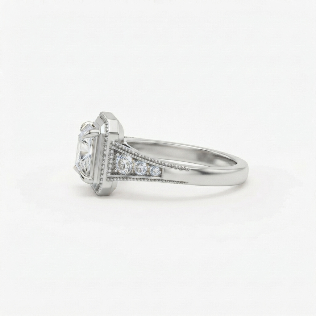 Side profile view showing tapered shoulder accent diamonds and white gold milgrain frame on a 2 CT princess cut ring.