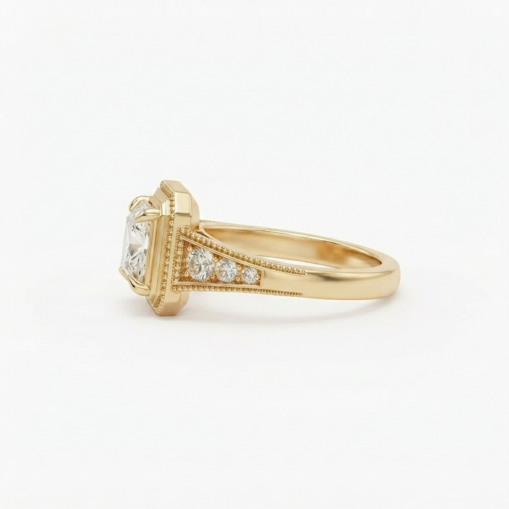 Side perspective view showing smooth band and milgrain tapered shoulders on a yellow gold 2 CT princess cut ring.