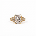 Top front view of a 4 CT radiant cut lab grown diamond held by heart-corner prongs on a wide double-row pavé diamond band.
