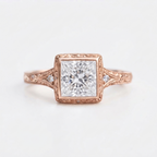 Top view of a 4 CT princess cut lab grown diamond vintage bezel ring in 14K rose gold with hand-carved scrollwork.