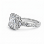 Side angle profile of a white gold 4 CT princess cut lab diamond ring highlighting hand-carved vintage scroll patterns.