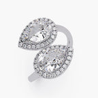 Front view of a white gold Toi et Moi bypass ring featuring two halo-set pear cut lab-grown diamonds.