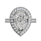 Top view of a 3 CT pear cut lab grown diamond engagement ring featuring a double halo with milgrain detail and pavé band.