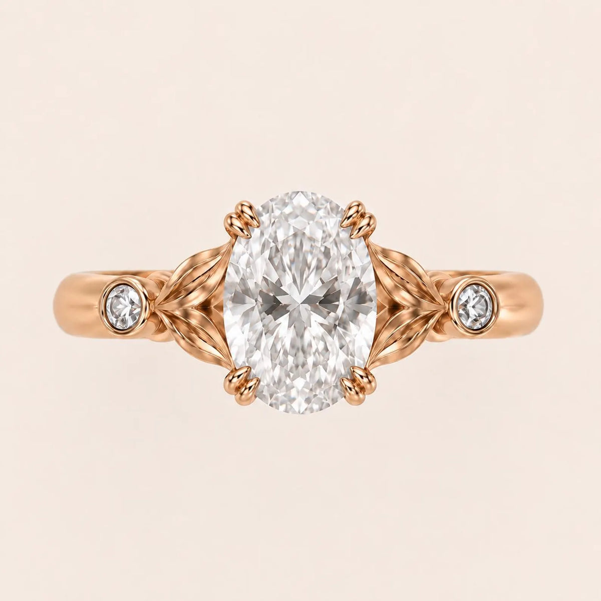 Top view of a 3 CT oval cut lab grown diamond engagement ring with leaf motif shoulders and bezel side diamonds in rose gold.