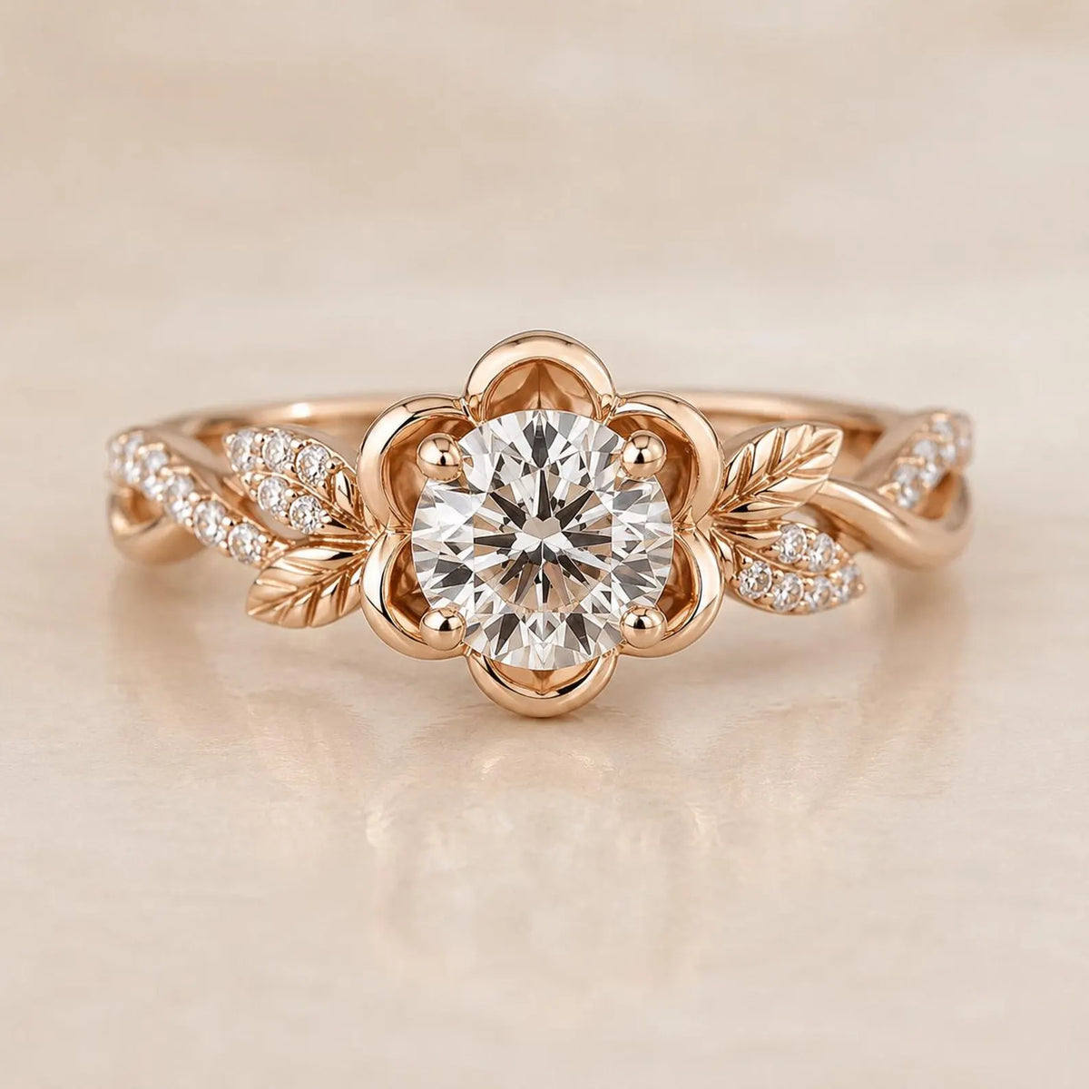 Top view of a 2 CT round cut lab grown diamond set inside a rose gold floral petal halo with leaf accents.