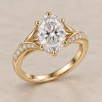 Three-quarter perspective view of a 3 carat oval lab diamond ring highlighting curved pavé accents and yellow gold band.