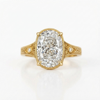 Top view of a 5 CT oval cut lab grown diamond ring with hand-engraved leaf shoulders and milgrain trim in yellow gold.