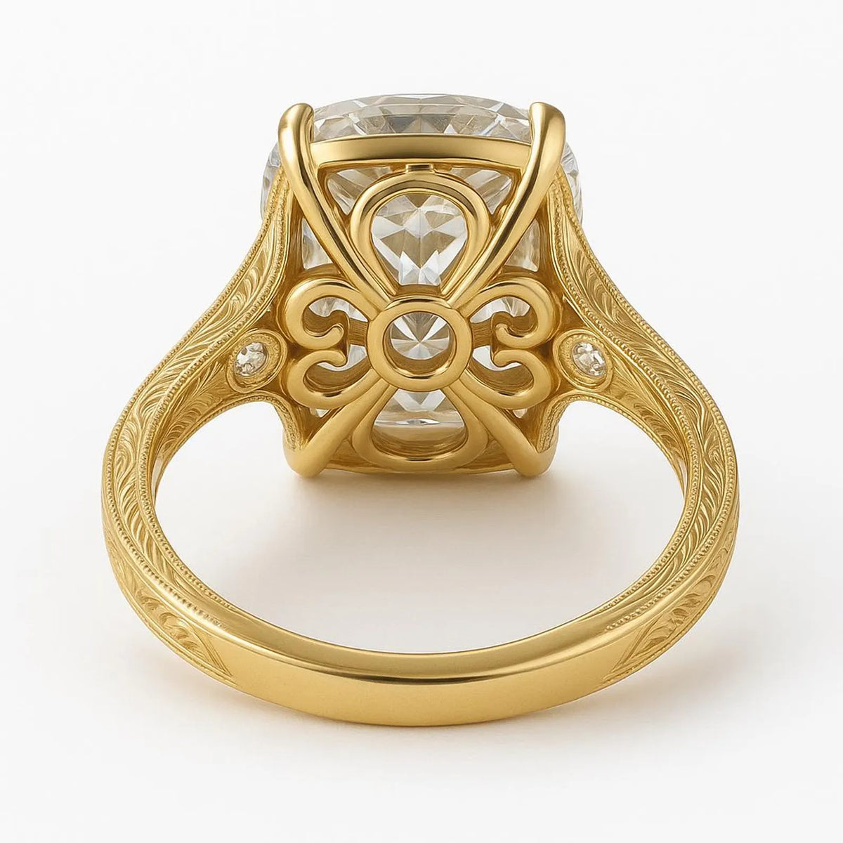 Undergallery profile view of a 5 CT oval lab diamond ring featuring intricate filigree scrollwork in yellow gold.