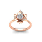 High-angle front view of a 3 CT round lab grown diamond rose gold flower ring.