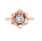 Top-down view of a 3 CT round lab diamond set in a rose gold lotus petal frame with accent diamonds.