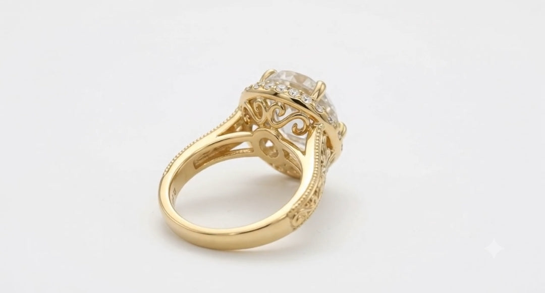 Perspective view showing open swirl filigree detailing beneath the halo setting of a 4 CT round lab diamond ring.