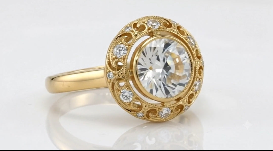 Angled side view of a 4 CT round lab grown diamond ring with a bezel setting and openwork filigree halo in yellow gold.