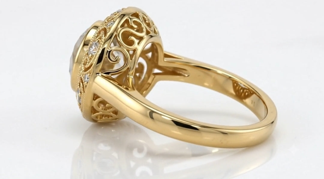 Side profile view highlighting open scrollwork filigree gallery beneath a bezel set 4 CT round lab diamond.
