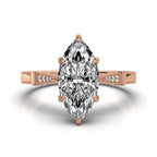 Top view of a 4 carat marquise cut lab grown diamond in a rose gold 6-prong setting with milgrain accented shoulders.
