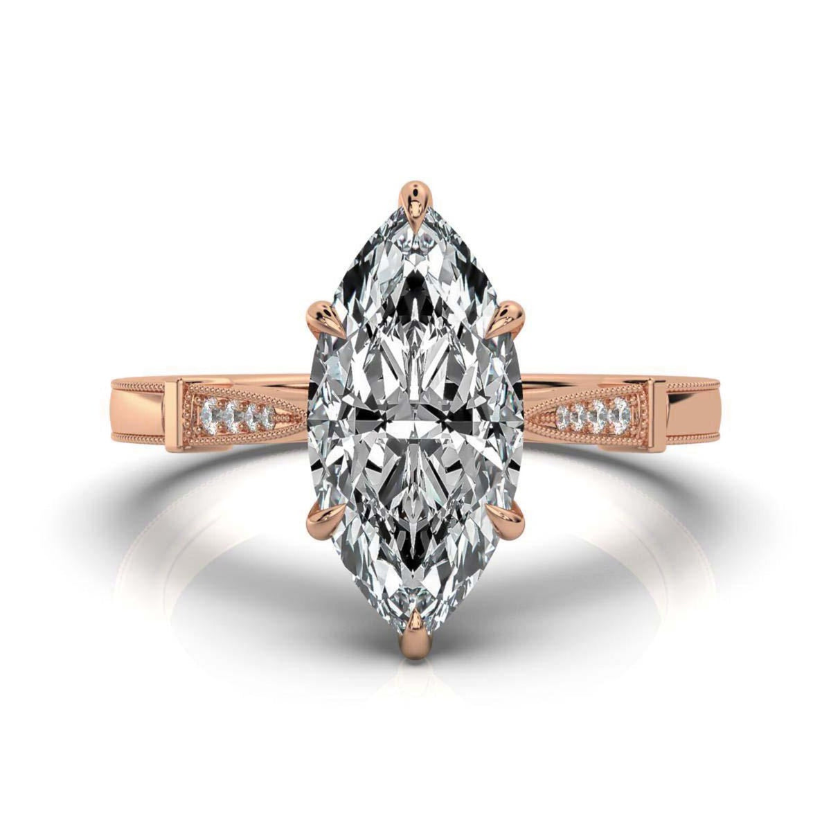 Top view of a 4 carat marquise cut lab grown diamond in a rose gold 6-prong setting with milgrain accented shoulders.