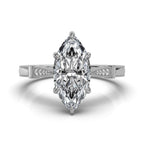 Overhead top-down view of a 4 CT marquise cut lab diamond set in white gold with tapered milgrain shoulders.