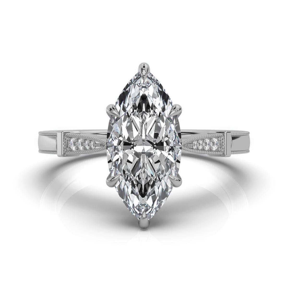 Overhead top-down view of a 4 CT marquise cut lab diamond set in white gold with tapered milgrain shoulders.