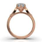 Direct side profile view of a rose gold vintage cathedral setting holding a 4 CT marquise lab diamond.