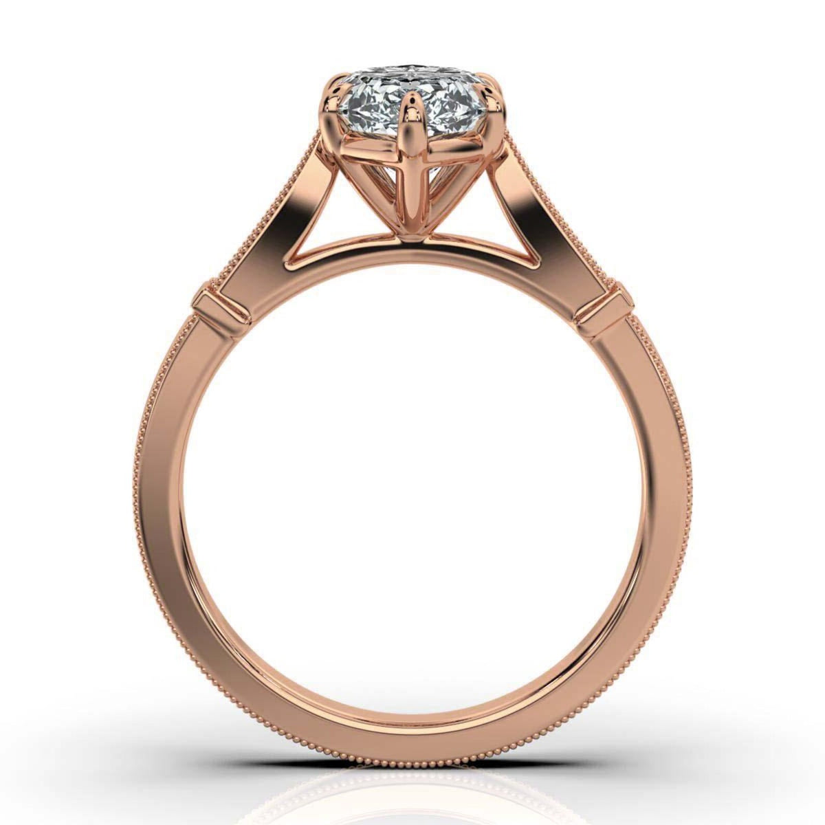 Direct side profile view of a rose gold vintage cathedral setting holding a 4 CT marquise lab diamond.