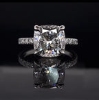 Direct top-down view of a breathtaking 3 CT cushion cut lab grown diamond engagement ring emphasizing its brilliant faceting and perfect symmetry.