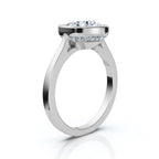 Side perspective of a white gold 4 carat round lab diamond engagement ring showing smooth bezel collar and hidden micro-pavé halo.