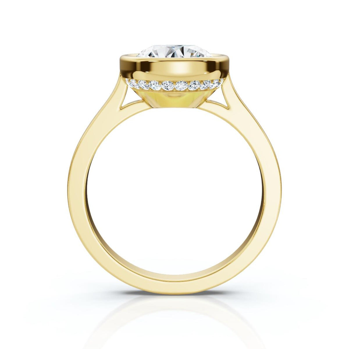 Direct side profile of a 4 carat round lab diamond ring in yellow gold highlighting the cathedral arch and hidden halo rim.