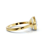 Side-angled view displaying the sleek yellow gold band and hidden halo undergallery beneath the 4 CT round bezel set center.