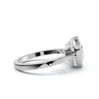 Side-angled view of a 4 CT heart cut lab grown diamond ring in white gold featuring a smooth bezel frame and hidden diamond halo undergallery.
